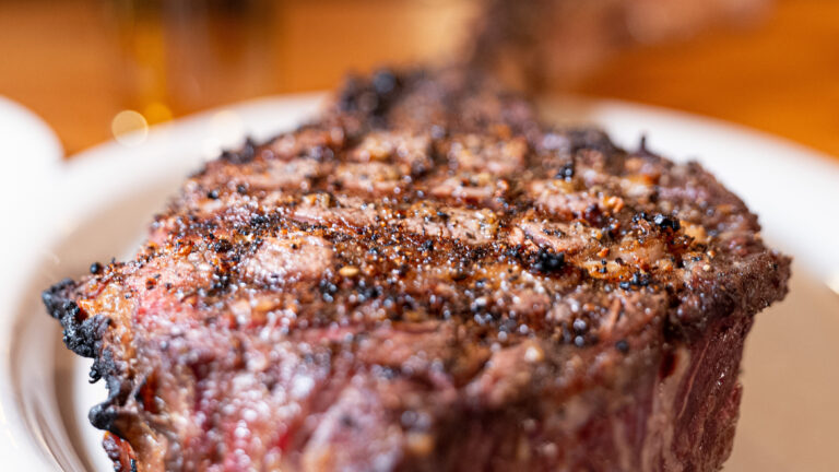 A char-grilled cowboy steak